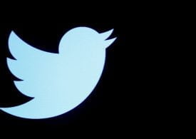 Twitter shares rise on record yearly growth in daily users