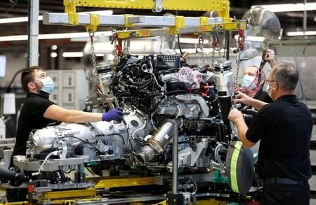 UK factories grow for fourth month, job losses slow